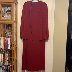 Red crepe like sheath dress with matching jacket.
